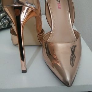 Rose gold pumps